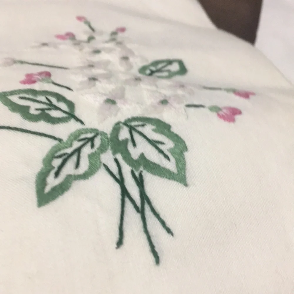 PEACH embroidered flowers tea towel. You this that particular one.